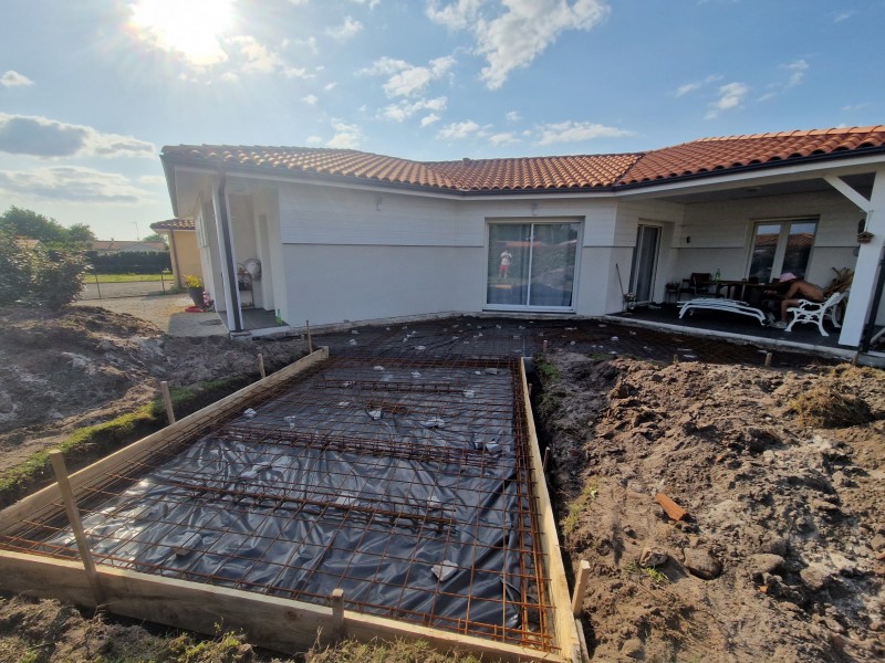 Construire une terrasse en béton avec dalle pour jacuzzi à Mimizan
