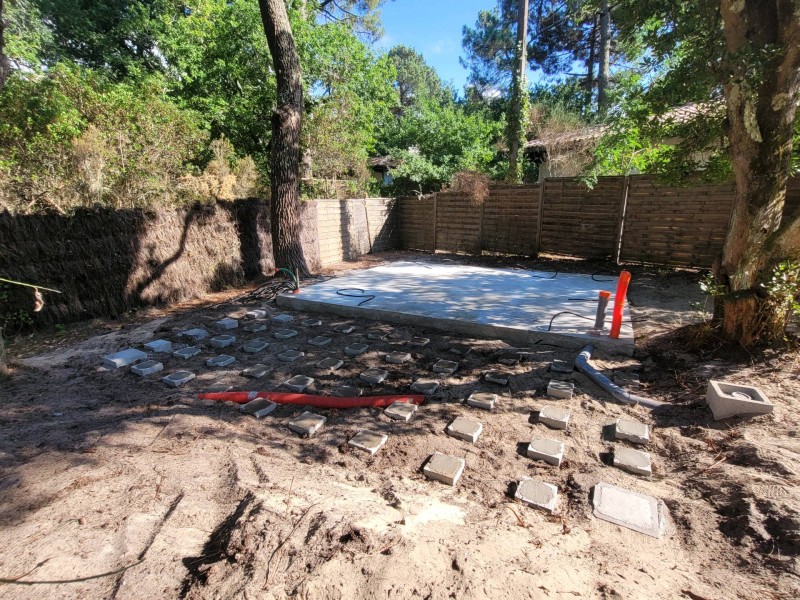 Mise en place d’une dalle en béton pour un chalet en bois