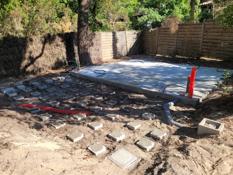 Mise en place d’une dalle en béton pour un chalet en bois situé à Pyla-sur-Mer