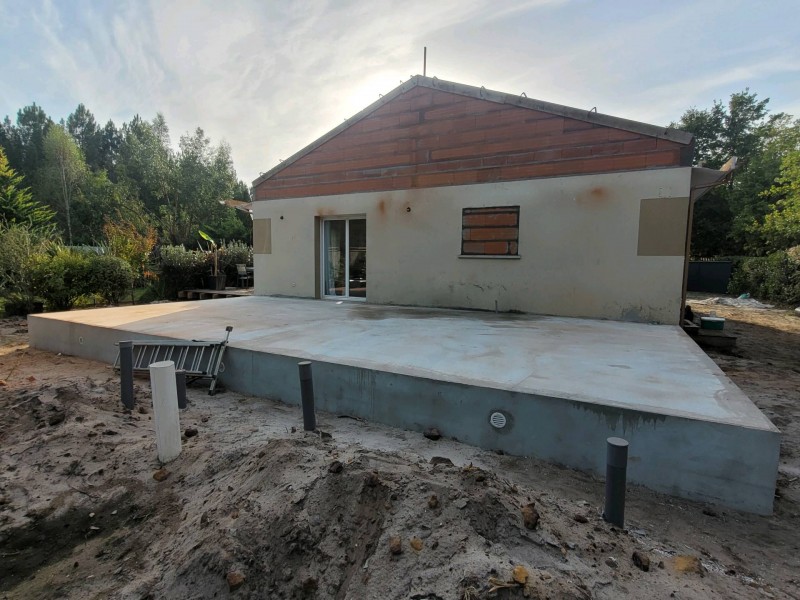 Comment faire pour réaliser un agrandissement pour une maison située à Sanguinet