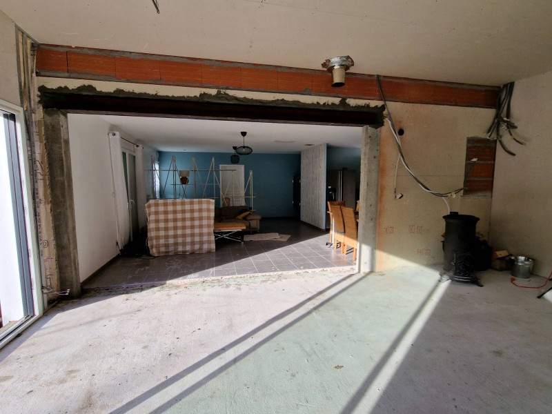 Réaliser une ouverture entre deux pièces dans une maison située à La Teste-de-Buch